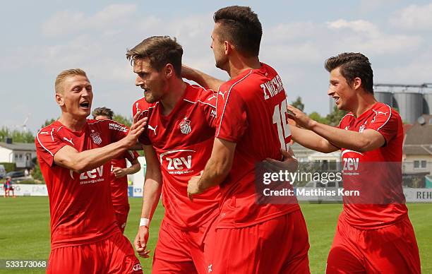 Jonas Nietfeld of Zwickau jubilates with team mates after scoring his teams second goal during the Regionalliga Nordost match between FC Schoenberg...