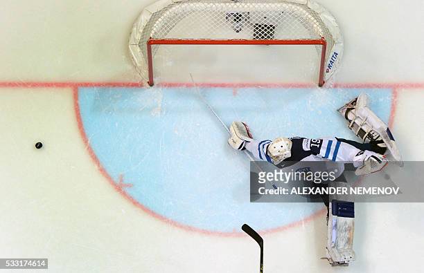 Finland's goalie Mikko Koskinen saves his net during the semifinal game Finland vs Russia at the 2016 IIHF Ice Hockey World Championship in Moscow on...