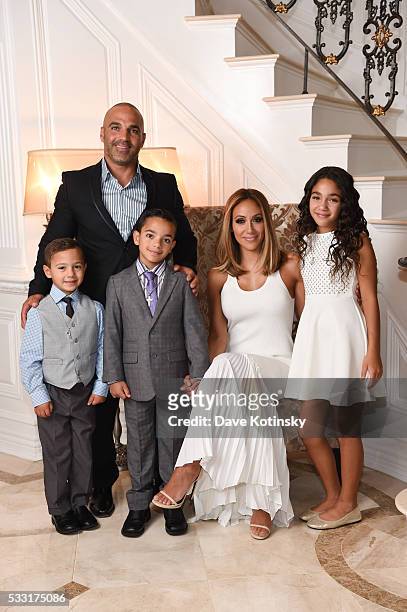 Joe Gorga, Joey Gorga Jr, Antonia Gorga, Gino Gorga and Melissa Gorga pose at home before their son's Gino Gorga's First Communion on May 21, 2016 in...