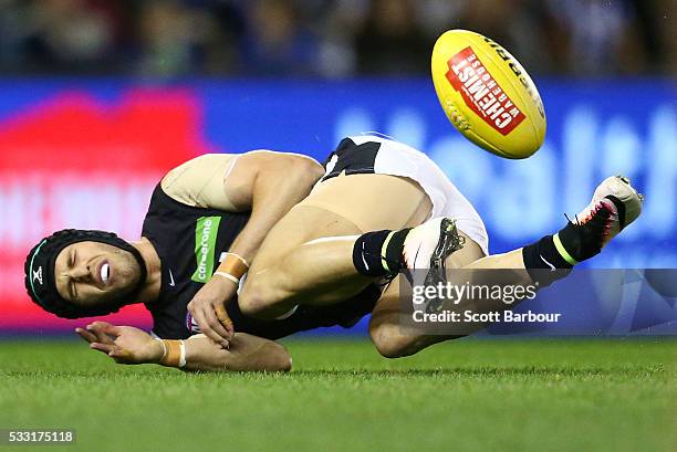 Marc Murphy of the Blues compete for the ball during the round nine AFL match between the North Melbourne Kangaroos and the Carlton Blues at Etihad...