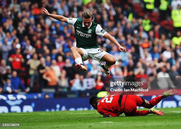 Jason Cummings of Hibernian vies with Wes Foderingham of Rangers during the Scottish Cup Final between Rangers and Hibernian at Hampden Park on May...