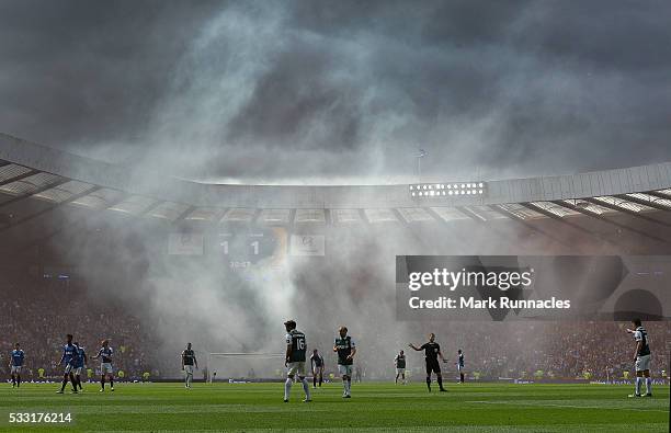 Rangers fans set off flares after Kenny Miller of Rangers scores their first goal in the first half during the William Hill Scottish Cup Final...