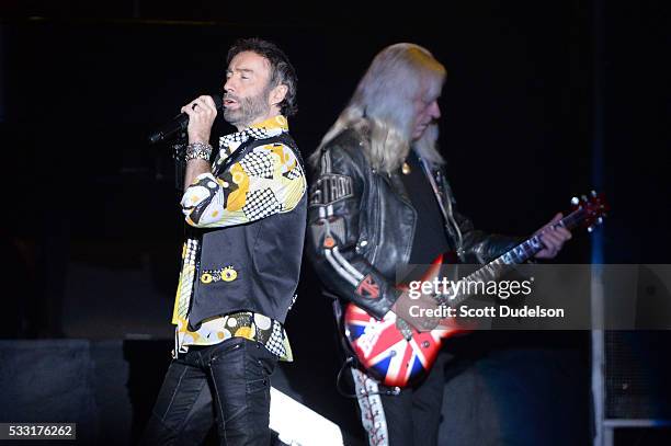 Singer Paul Rodgers and Howard Leese of the band Bad Company perform onstage during the "One Hell of a Night Tour" at The Forum on May 20, 2016 in...