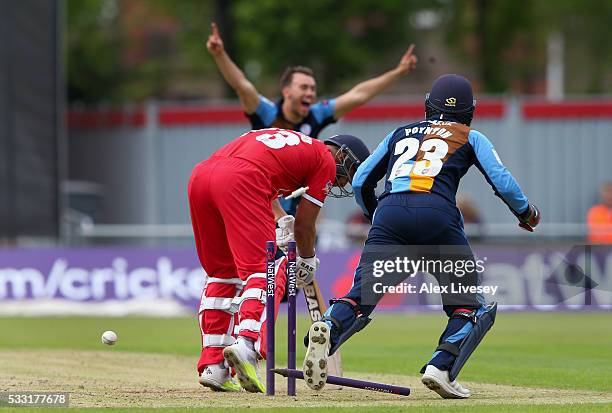 Alviro Petersen of Lancashire is bowled by Alex Hughes of Derbyshire during the NatWest T20 Blast between Lancashire and Derbyshire at Old Trafford...