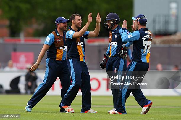 Alex Hughes of Derbyshire celebrates with Hamish Rutherford after taking the wicket of Alviro Petersen of Lancashire during the NatWest T20 Blast...