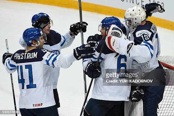Finland's players celebrate after winning the semifinal game Finland vs Russia at the 2016 IIHF Ice Hockey World Championship in Moscow on May 21,...