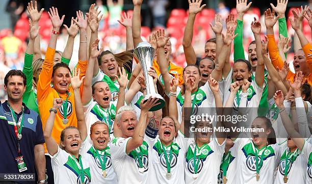 Nilla Fischer of Wolfsburg and team celebrate the winning of the cup after the women's cup final between SC Sand and VFL Wolfsburg at...