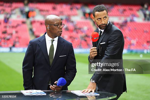 Commentators Ian Wright and Rio Ferdinand are seen prior to The Emirates FA Cup Final match between Manchester United and Crystal Palace at Wembley...