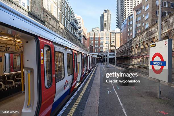 barbican tube station london - barbican stock pictures, royalty-free photos & images