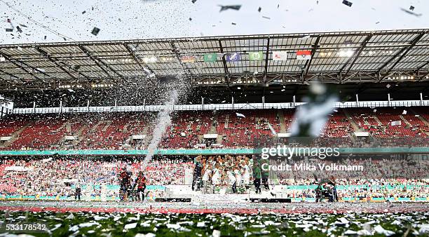 Team Wolfsburg celebrate the winning of the cup after the women's cup final between SC Sand and VFL Wolfsburg at RheinEnergieStadion on May 21, 2016...