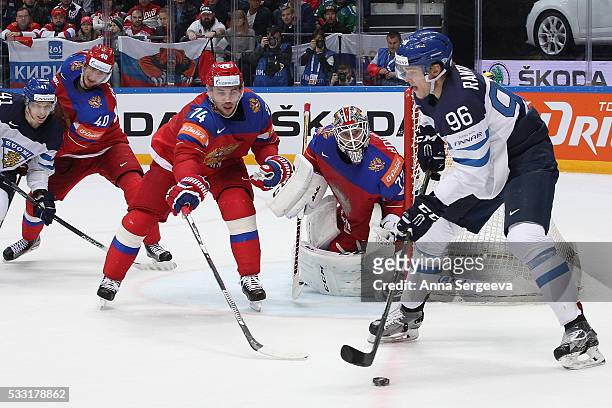 Mikko Rantanen of Finland plays the puck against Alexei Yemelin of Russia at Ice Palace on May 21, 2016 in Moscow, Russia.