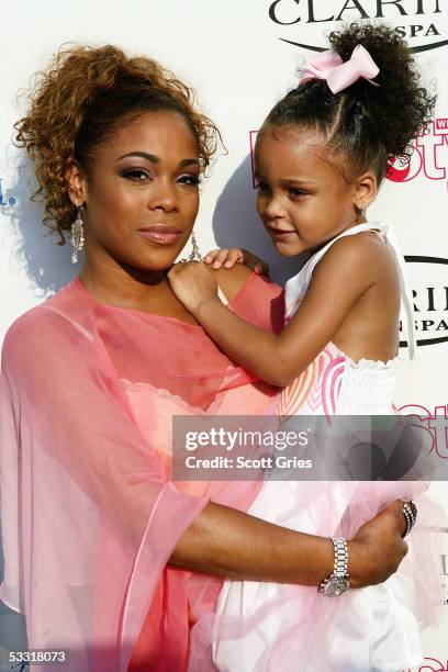 Tionne "T Boz" Watkins of TLC and her daughter Chase Rolison arrive at a fashion show and party to benefit the Make A Wish Foundation at The Park...