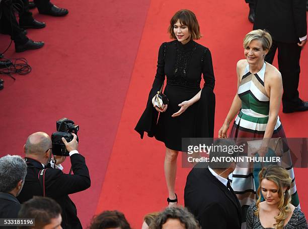 French Canadian actress Marie-Josee Croze and French producer Melita Toscan du Plantier pose as they arrive on May 21, 2016 for the screening of the...