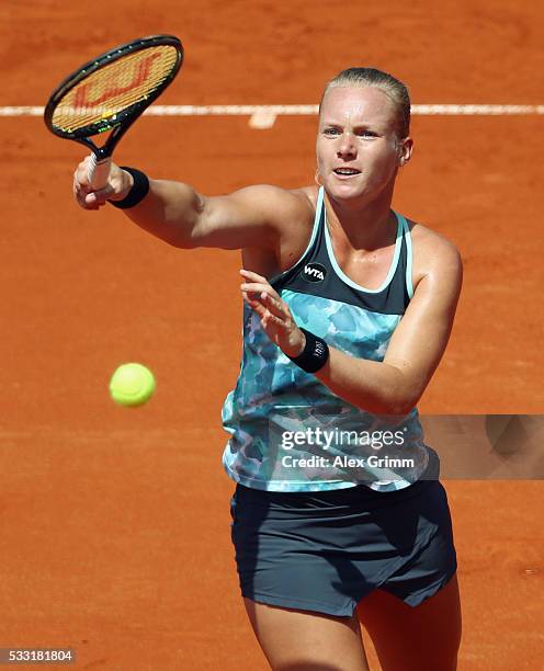 Kiki Bertens of Netherlands returns the ball to Mariana Duque-Marino of Colombia during their singles final match on day eight of the Nuernberger...