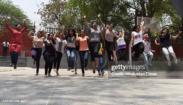 Girl students in jubilant mood after their Class XII Board Examination results declared at St. Thomas School, on May 21, 2016 in New Delhi, India. A...