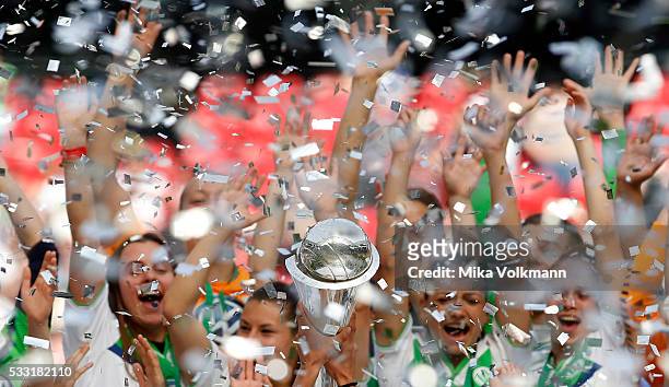 Team Wolfsburg celebrate the winning of the trophy after the women's cup final between SC Sand and VFL Wolfsburg at RheinEnergieStadion on May 21,...