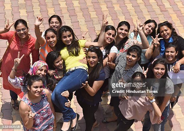 Girl students in jubilant mood after their Class XII board examination result declared, at St. Thomas School, on May 21, 2016 in New Delhi, India. A...