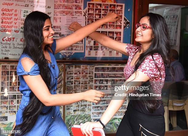 Girl students in jubilant mood after their Class XII board examination result declared, at St. Thomas School, on May 21, 2016 in New Delhi, India. A...