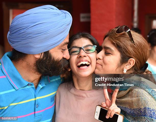 Girl students in jubilant mood after their Class XII board examination result declared, at St. Thomas School, on May 21, 2016 in New Delhi, India. A...