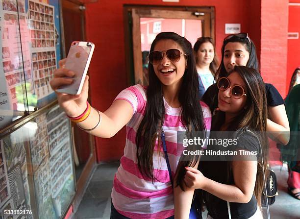 Girl students in jubilant mood after their Class XII board examination result declared, at St. Thomas School, on May 21, 2016 in New Delhi, India. A...