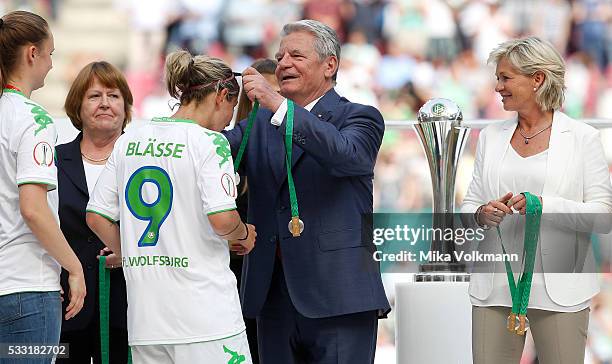 Joachim Gauck and Silvia Neid awarded the medals during the women's cup final between SC Sand and VFL Wolfsburg at RheinEnergieStadion on May 21,...