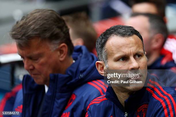 Louis van Gaal manager of Manchester United and Ryan Giggs assistant manager of Manchester United look on prior to The Emirates FA Cup Final match...
