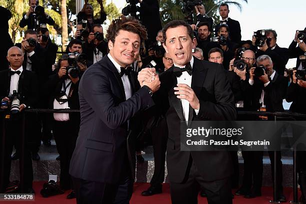 Gad Elmaleh and Kev Adams attend the "Elle" Premiere during the 69th annual Cannes Film Festival at the Palais des Festivals on May 21, 2016 in...