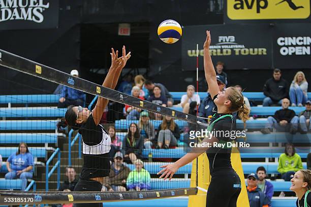 Jantine van der Vlist of the Netherlands hits the ball over the net against Chen Xue of China during day 5 of the 2016 AVP Cincinnati Open on May 21,...