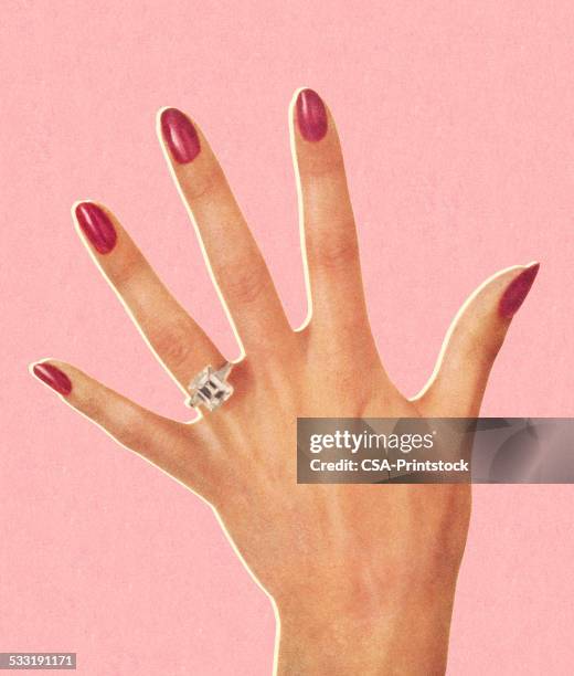 woman's hand wearing engagement ring - fingernail stock illustrations