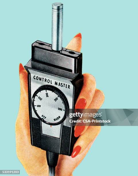 hand holding a controller - appliance stock illustrations