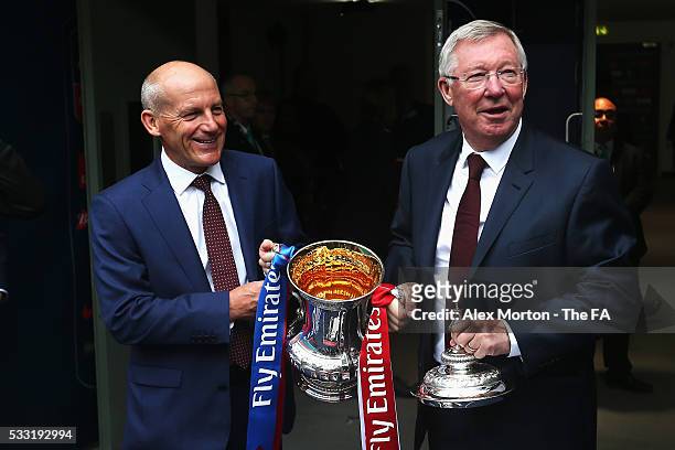 Steve Coppell and Sir Alex Ferguson present the FA Cup Trophy prior to The Emirates FA Cup Final match between Manchester United and Crystal Palace...