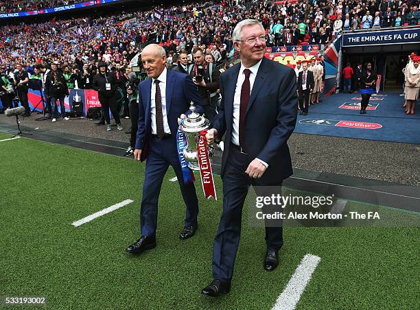 Steve Coppell and Sir Alex Ferguson present the FA Cup Trophy prior to The Emirates FA Cup Final match between Manchester United and Crystal Palace...