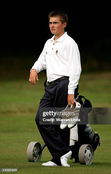 Jamie Abbott of England looks on as his teammate goes on to win another singles match for England during the R&A Boys Home Internationals on the...