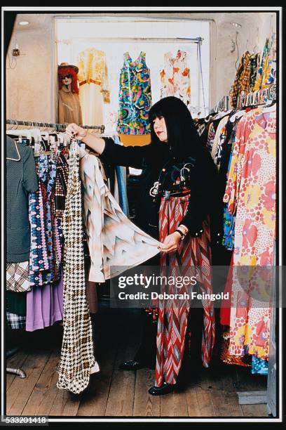 Deborah Feingold/Corbis via Getty Images) Anna Sui Adjusting Racks of Clothing