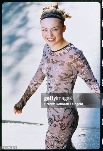 Deborah Feingold/Corbis via Getty Images) Monica Keena Walking and Smiling