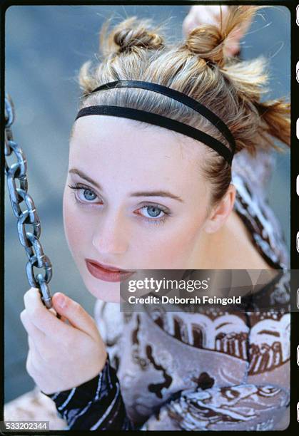 Deborah Feingold/Corbis via Getty Images) Monica Keena Holding onto a Chain