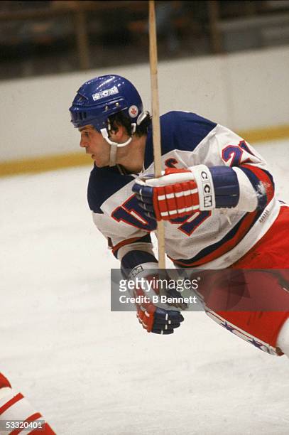 American hockey player Mike Eruzione of Team USA skates on the ice during an 1980 exhibition game against the Soviet Union on February 9, 1980 at the...