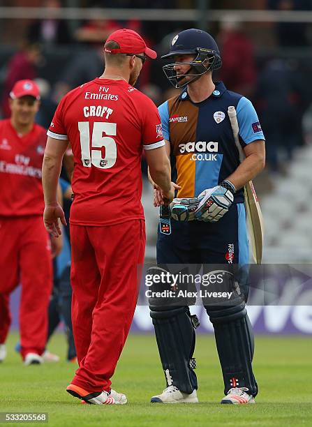 Neil Broom of Derbyshire shakes hands with Steven Croft of Lancashire after the NatWest T20 Blast between Lancashire and Derbyshire at Old Trafford...