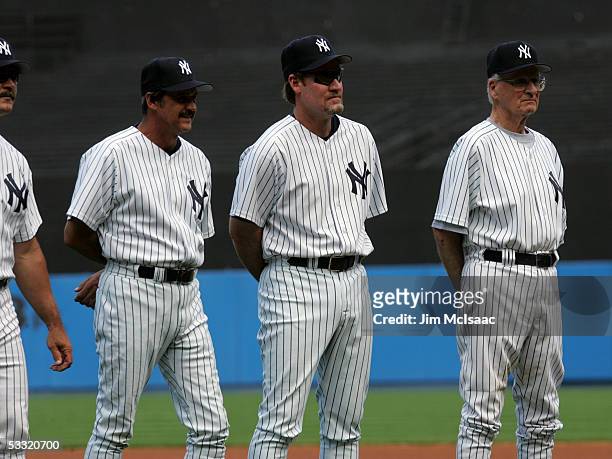 Ron Guidry stands next to Wade Boggs and Jerry Coleman during the New York Yankees 59th annual old-timers' day before the start of the Yankees game...