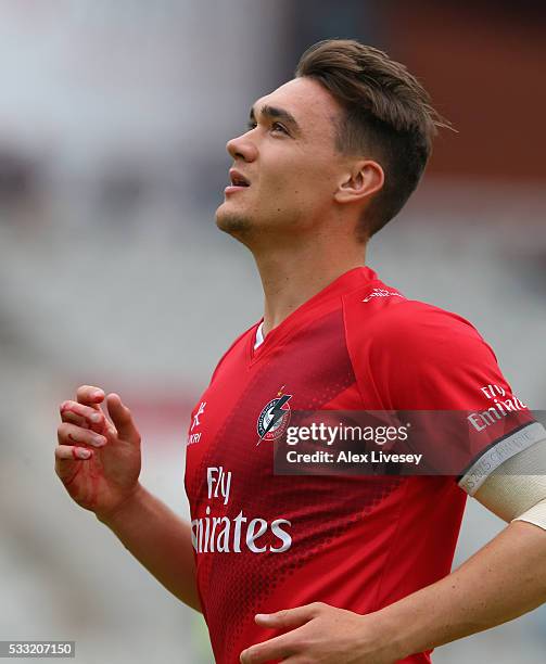 Gavin Griffiths of Lancashire leaves the pitch with an injured hand from attemting a catch during the NatWest T20 Blast between Lancashire and...