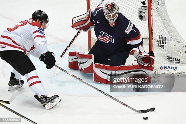 Canada's forward Brad Marchand attacks US goalie Keith Kinkaid during the semifinal game Canada vs USA at the 2016 IIHF Ice Hockey World Championship...