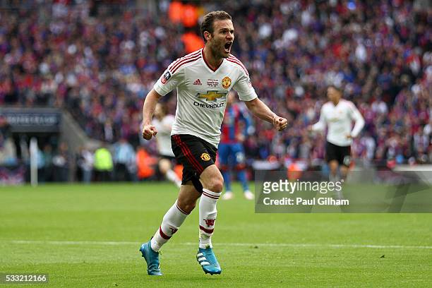 Juan Mata of Manchester United celebrates as he scores their first goal during The Emirates FA Cup Final match between Manchester United and Crystal...