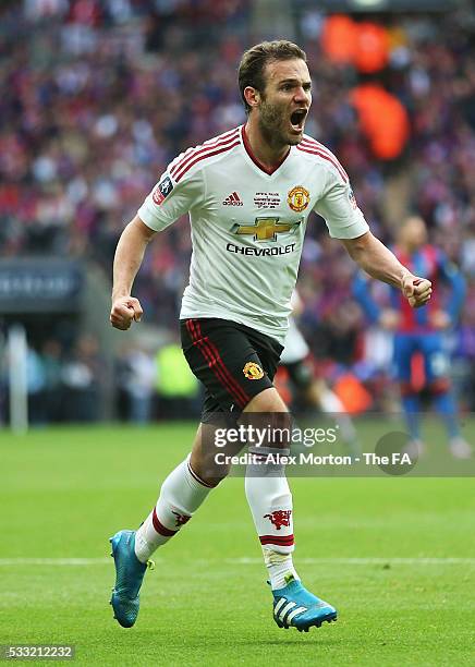 Juan Mata of Manchester United celebrates scoring his team's first goal during The Emirates FA Cup Final match between Manchester United and Crystal...