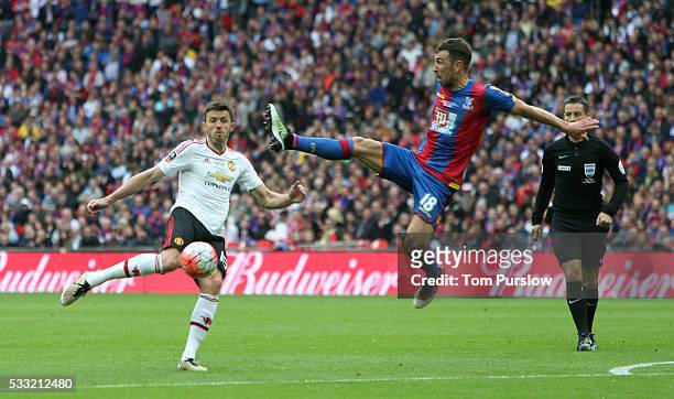 Michael Carrick of Manchester United in action with James McArthur of Crystal Palace during The Emirates FA Cup final match between Manchester United...