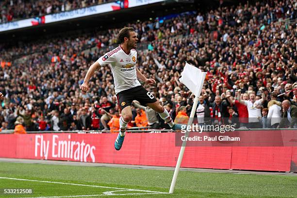Juan Mata of Manchester United celebrates as he scores their first goal during The Emirates FA Cup Final match between Manchester United and Crystal...