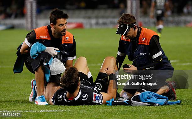 Alan Kourie with Paul Jordaan of the Cell C Sharks and Deane Macquet during the round 13 Super Rugby match between Cell C Sharks and Southern Kings...