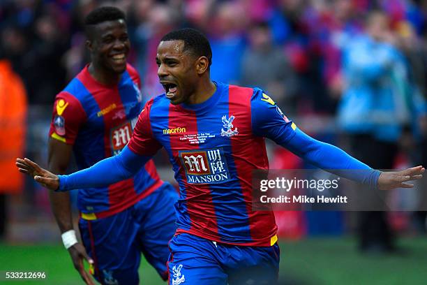 Jason Puncheon of Crystal Palace celebrates with Wilfried Zaha as he scores their first goal during The Emirates FA Cup Final match between...