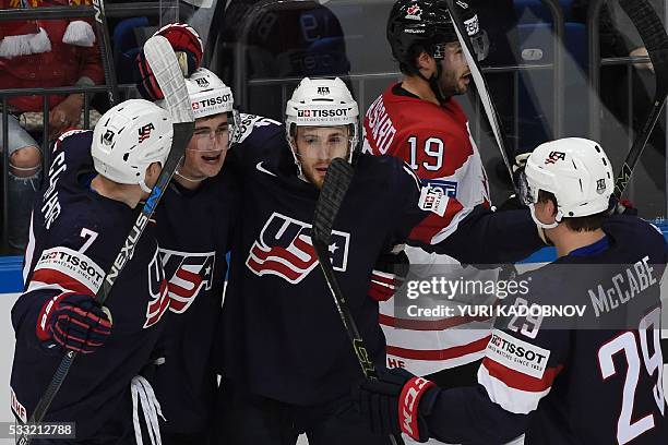 Players celebrate a goal during the semifinal game Canada vs USA at the 2016 IIHF Ice Hockey World Championship in Moscow on May 21, 2016. / AFP /...