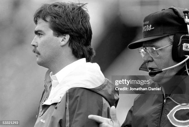 Assistant coach Jeff Fisher and defensive coordinator Buddy Ryan of the Chicago Bears look on during the game against the Green Bay Packers at...