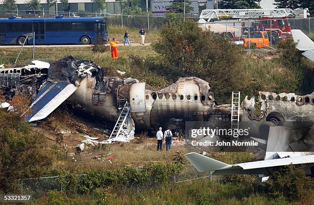 Wreckage of Air France flight 358 is seen at Pearson International Airport August 3, 2005 in Toronto, Ontario, Canada. All 309 passengers and crew...